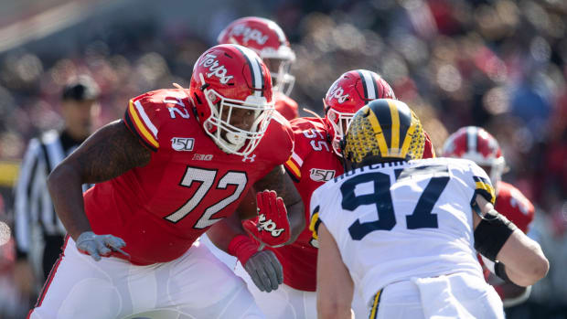 Nov 2, 2019; College Park, MD, USA; Maryland Terrapins offensive lineman Marcus Minor (72) and offensive lineman Austin Fontaine (55) block Michigan Wolverines defensive lineman Aidan Hutchinson (97) during the first half at Capital One Field at Maryland Stadium. Mandatory Credit: Tommy Gilligan-USA TODAY Sports